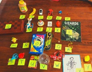 Items lined up and with yellow labels for each letter of the alphabet