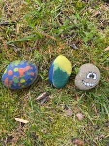 Three small painted rocks