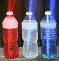Three water bottles filled with red, white, and blue water