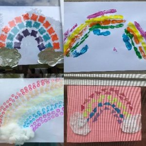 Four examples of rainbow art created on paper with paint, stickers and cotton balls