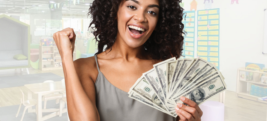 A woman holding a fan of money